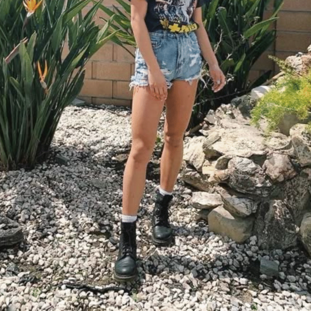 Ripped High Waisted Jean Shorts Paired with Dr Martens