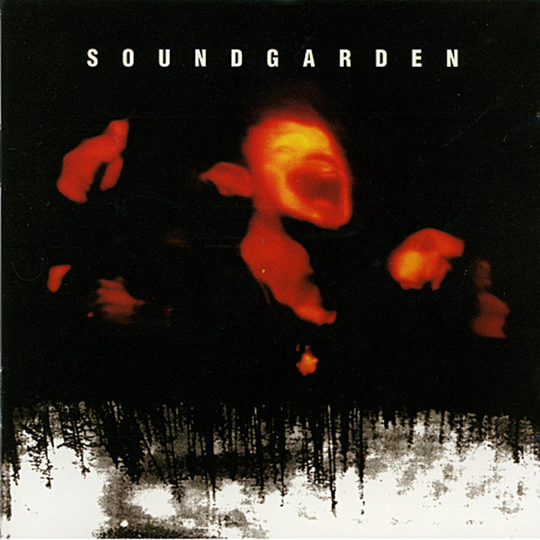 Soundgarden’s Badmotorfinger album cover with a hypnotic, industrial design representing the heavy, distorted energy of grunge music.