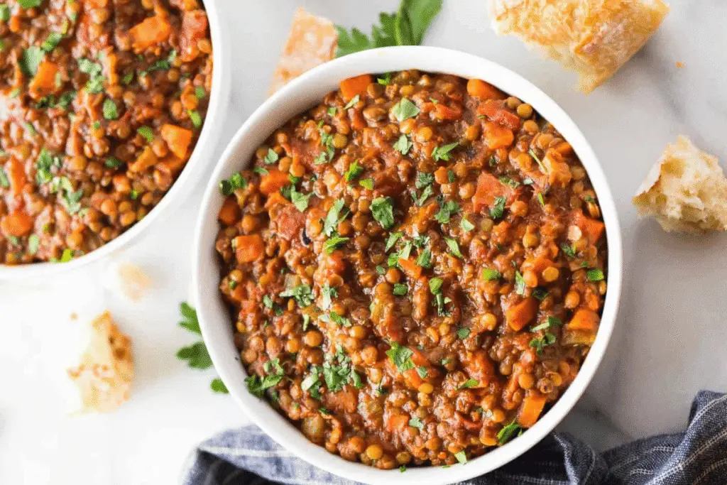 Warm lentil soup in a bowl, rich in flavor and protein – easy and healthy Gluten Free Instant Pot Recipes.