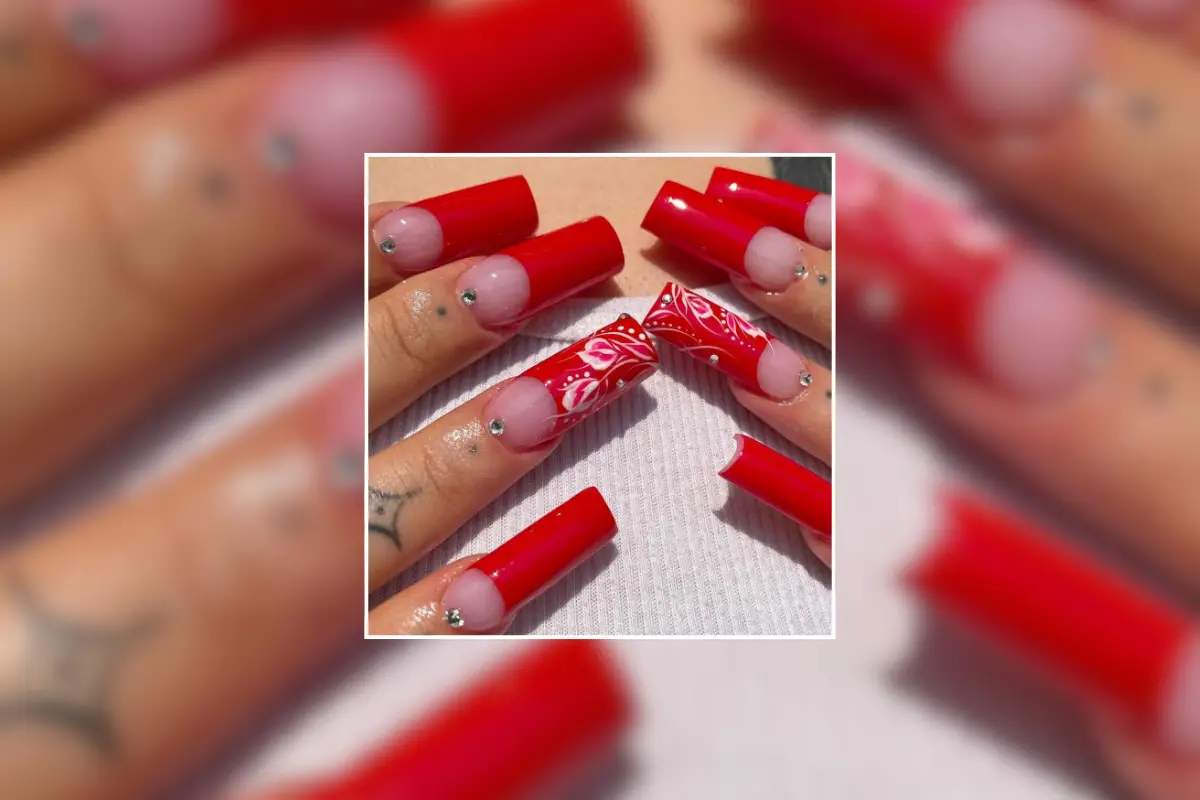 Red nails styled in a classic 90s nail look, glossy and bold, capturing the vibrant, retro manicure trends of the 1990s.