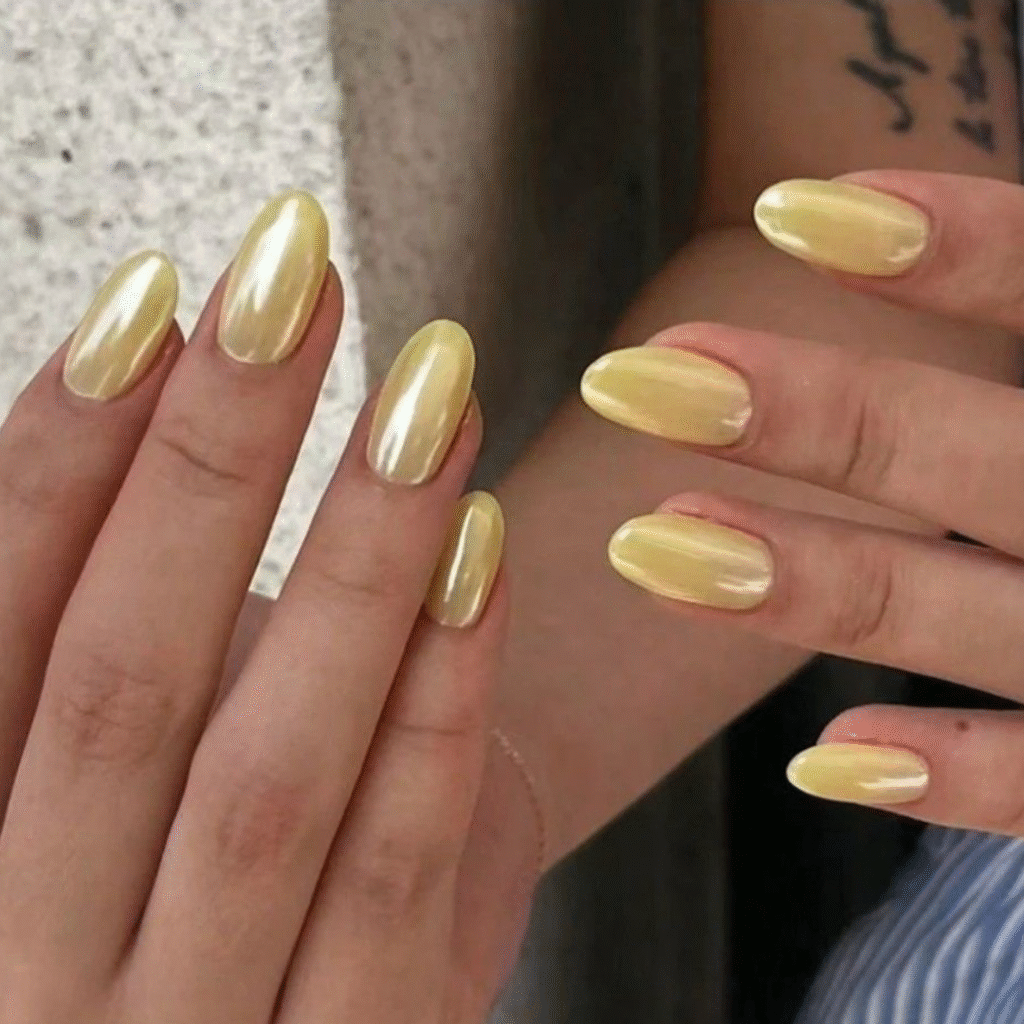 Bright yellow cat eye nail color with a sunny shimmer and subtle magnetic reflection.