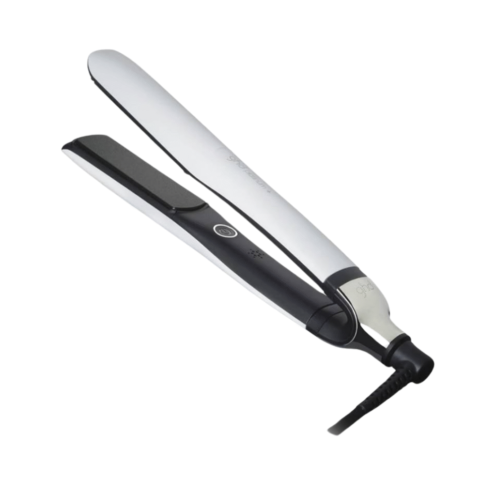 GHD Platinum+ Styler flat iron displayed as a tool for how to style curtain bangs, ensuring sleek, smooth, and perfectly shaped bangs at home.
