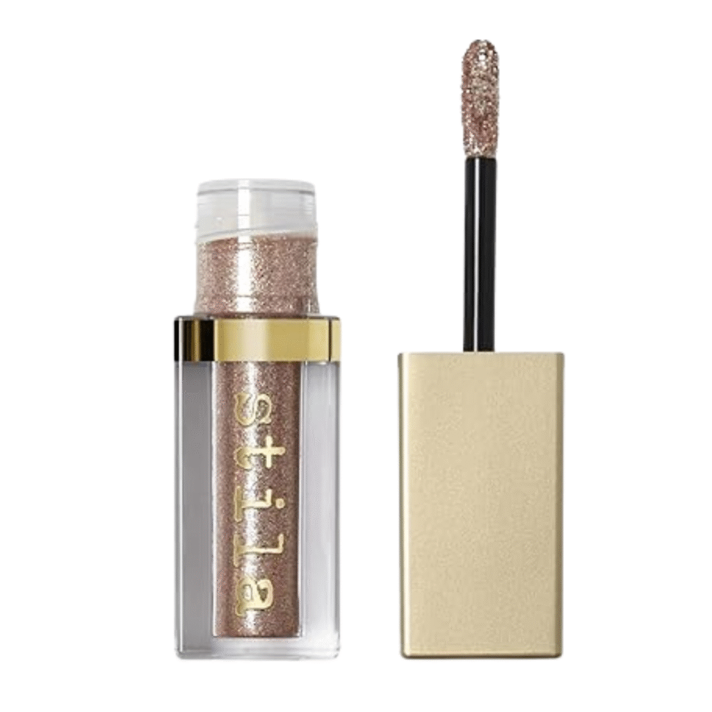 Stila Glitter & Glow Eye Shadow shown as a sparkly essential for dramatic Y2K makeup looks.